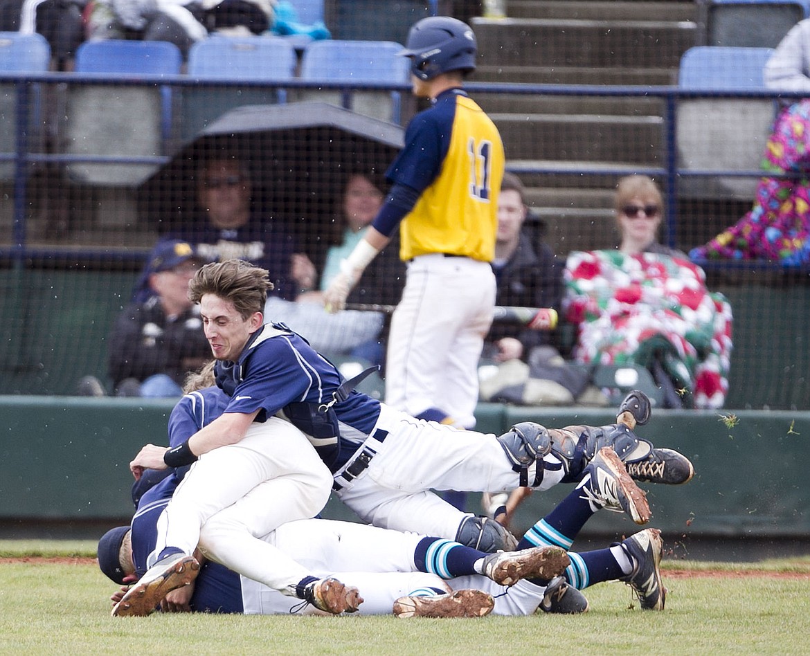 &lt;p&gt;KYLE GREEN/The Idaho Statesman&lt;/p&gt;&lt;p&gt;Lake City High School players celebrate after the last out of the game during the 5A state high school baseball championship held at Memorial Stadium in Boise, Idaho. Lake City defeated Meridian 4-1. Saturday May 21, 2016&lt;/p&gt;