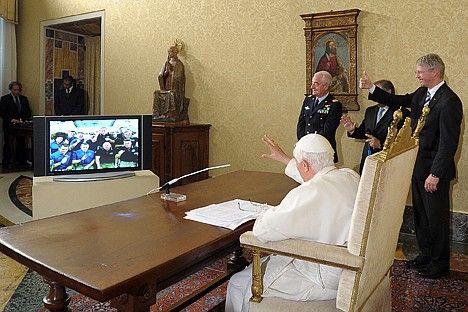 &lt;p&gt;Pope Benedict XVI talks with astronauts, at the Vatican, Saturday. The 12 astronauts circling the Earth received the first-ever papal call to space.&lt;/p&gt;