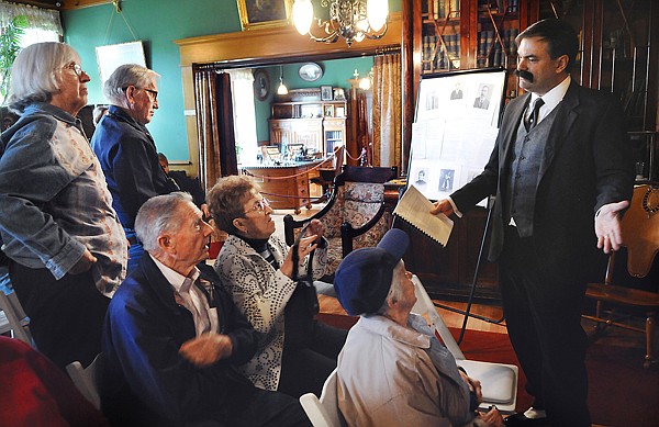 Conrad Museum Director Mike Kofford speaks with members of the audience after performing the part of Charles Conrad in the dramatic reading of a short version &quot;Charlie: In Celebration of an Extraordinary Life&quot; by Jan Hardesty of Kalispell. Kofford said they hope to put on a full performance of the play in July.