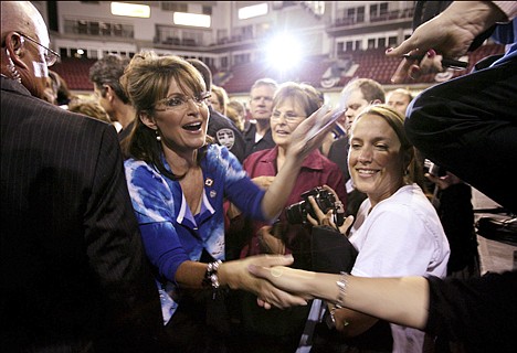 &lt;p&gt;Sarah Palin greets people at the Qwest Arena in Boise on Friday after giving a speech for Republican Vaughn Ward, who is running for a seat in congress. Palin had to quickly buy a new outfit before the rally because her luggage got lost.&lt;/p&gt;