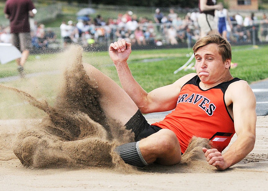 &lt;p&gt;Flathead's Jess Beaman crashes in the pit during the triple jump at the Class AA track and field state championship at Legends Stadium on Saturday. Beaman won the event with a jump of 43 feet, 53/4 inches. (Aaric Bryan/Daily Inter Lake)&lt;/p&gt;