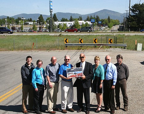 &lt;p&gt;The Greensferry Road overpass project in Post Falls reached a milestone Thursday with Ralph L. Wadsworth Construction of Draper, Utah, being awarded the construction contract with a total project cost of $14.7 million. From left are: Joe Sonnen, JUB Engineers; Terry Werner, Post Falls public services director; Bill Melvin, Post Falls engineer; Jerry Baltzell, Urban Renewal Agency commissioner; Mayor Ron Jacobson; Shelly Enderud, Post Falls administrator; Tom Lien, URA executive director; and Mike Worrall, JUB Engineers.&lt;/p&gt;