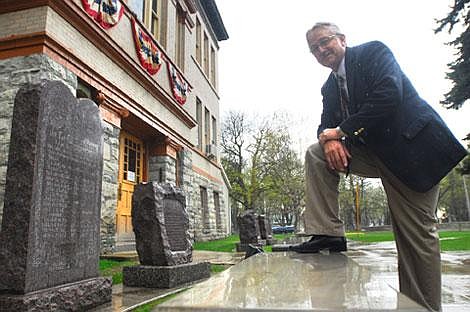 Flathead County Commissioner Gary Hall, next to the Ten Commandments monument at the Courthouse, is running for re-election. Hall, a Republican, was a big player in the fight to preserve the monument. Garrett Cheen/Daily Inter Lake