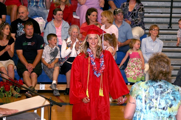 <p>Superior Salutatorian Kaitlynn Koke is all smiles as she walks to receive her high school diploma Sunday May 20.</p>