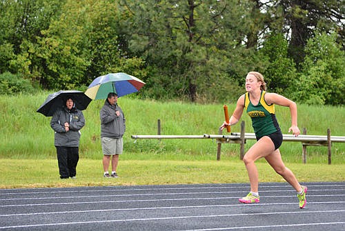 &lt;p&gt;Lydia Kryshak leads off the 1,600 relay with Jackie Fuller cheering her on Saturday at the Western A track meet in Frenchtown.&lt;/p&gt;