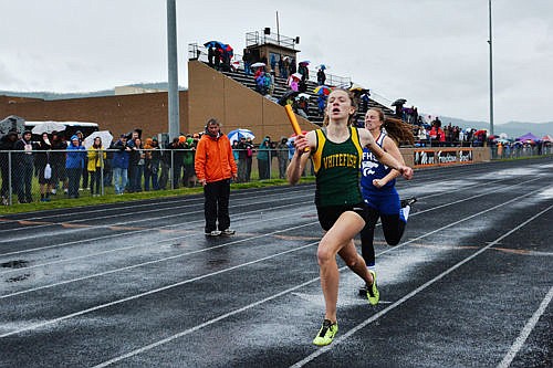 &lt;p&gt;Lauren Schulz holds off Columbia Falls for a second place in the 1,600 relay Saturday at the Western A track meet in Frenchtown.&lt;/p&gt;