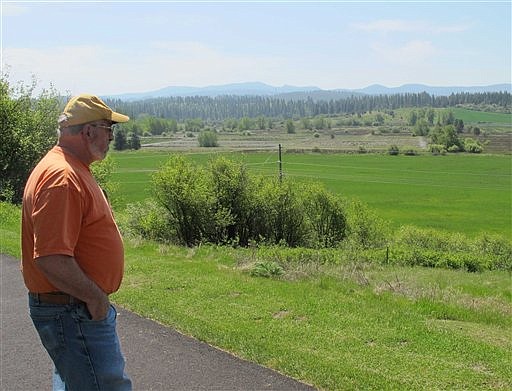 &lt;p&gt;Potlatch Mayor David Brown looks over the former sawmill site on Tuesday, May 15, 2012, in Potlatch, Idaho. The Potlatch community was once home to the nation's largest sawmill, but wants to be reborn as a gun town. Business leaders are actively seeking firearms and ammunition manufacturers to breath new life into Potlatch. (AP Photo/Nicholas K. Geranios)&lt;/p&gt;