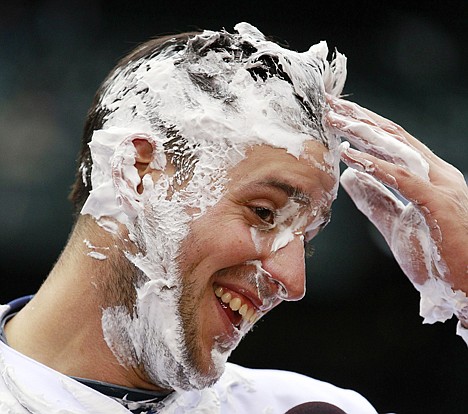 &lt;p&gt;Seattle Mariners' Alex Liddi wipes shaving cream from his face after being hit in the face with a plateful of it during an interview after the team defeated the Texas Rangers in a baseball game on Wednesday, May 23, 2012, in Seattle. Liddi hit a grand slam in the game and the Mariners won 5-3. (AP Photo/Elaine Thompson)&lt;/p&gt;