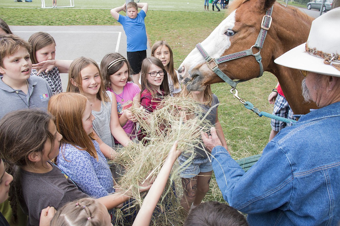 &lt;p&gt;Kids at Sorenson Elementary School pet and feed Betty the horse. Principal Janet Ackerman is retiring after this school year and brought her horses to school to celebrate.&lt;/p&gt;