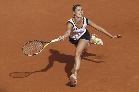 &lt;p&gt;Mathilde Johansson, of France, returns the ball to Julia Goerges of Germany during the first round match of the French Open tennis tournament at Roland Garros stadium in Paris. Goerges won the match in two sets, 6-1, 6-4.&lt;/p&gt;