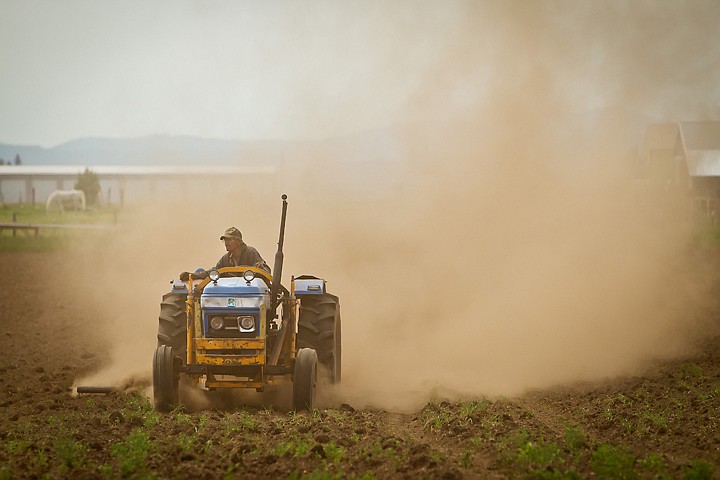 &lt;p&gt;JEROME A. POLLOS/Press Milbert Rohrbach navigates his way through a cloud of dust as he works his 10-acre field Monday along Atlas Road in Hayden. &quot;I get out here and remind the neighbors what farming is,&quot; Rohrbach said while sitting atop his 33-year-old tractor surveying the subdivisions to the east of his property. &quot;I bought this land in 1965 and that's what we did out here.&quot;&lt;/p&gt;