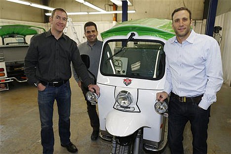 &lt;p&gt;Colin Sommers, left, director of engineering for eTuk USA, Walid Mourtada, center, chief executive officer, and Michael Fox show off one of their company's electric Tuk-Tuk models on Feb. 27 in northeast Denver.&lt;/p&gt;