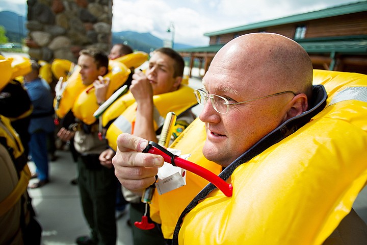 &lt;p&gt;SHAWN GUST/Press Tim Leeder, a Kootenai County Sheriff's deputy with the department's marine division, is one of nearly 30 to participate Thursday in a nationwide effort to set a world record for the number of inflatable life jackets to inflated in a single day. The National Safe Boating Council, the Canadian Safe Boating Council and Takashina USA held the event, locally at Cabela's, as a way to promote safe boating and the use of personal floatation devices.&lt;/p&gt;