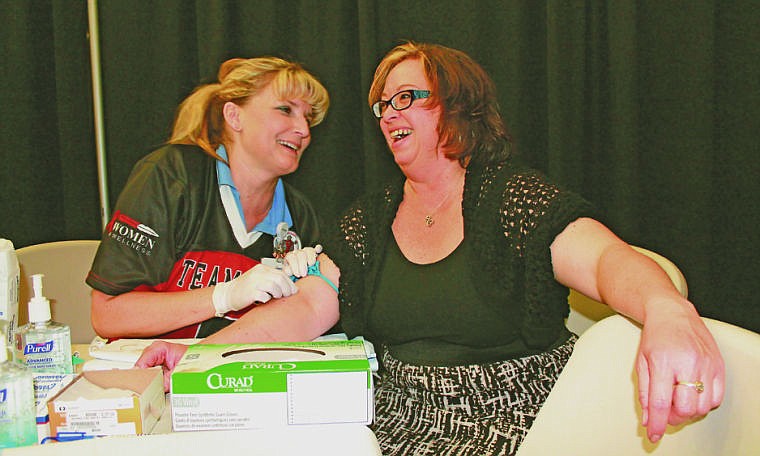 &lt;p&gt;Below: St. Joseph Medical Center R.N. Christine Cullen prepares Judy Meeks, of Ronan, for a blood panel sample at Thursday&#146;s Women 4 Wellness Health Fair hosted by the Center for Prevention and Wellness at the Joe McDonald Health &amp; Fitness Center in Pablo.&lt;/p&gt;