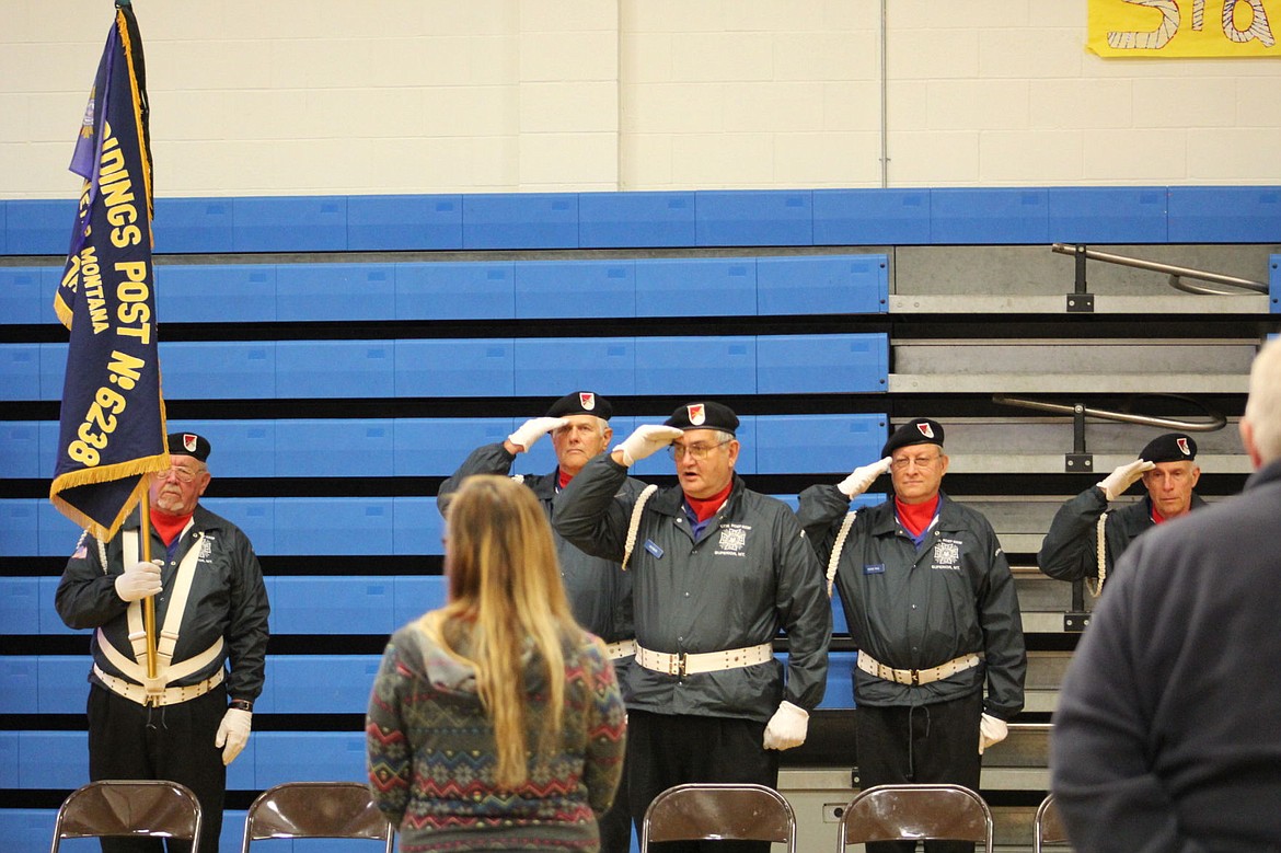 <p>The Superior Color Guard salutes veterans during a luncheon on Armed Forces Day. The luncheon was put on by the Retired Senior and Volunteer Program in Superior.</p>