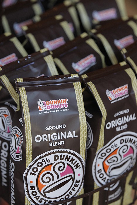 &lt;p&gt;In this Oct. 14, 2010, photo, bags of coffee sit on the shelves at a Dunkin' Donuts store located in Conseco Fieldhouse in Indianapolis. Coffee drinkers will get another jolt at the supermarket: the company that sells Folgers and Dunkin' Donuts brand coffees announced Tuesday its second double-digit price increase this year.&lt;/p&gt;