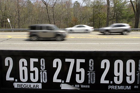 &lt;p&gt;Vehicles drive past a gas station in Andover, Mass., on May 8. Even after the typical springtime run-up, the average price for gallon of regular gasoline should top out around $2.60, experts say.&#160;&lt;/p&gt;