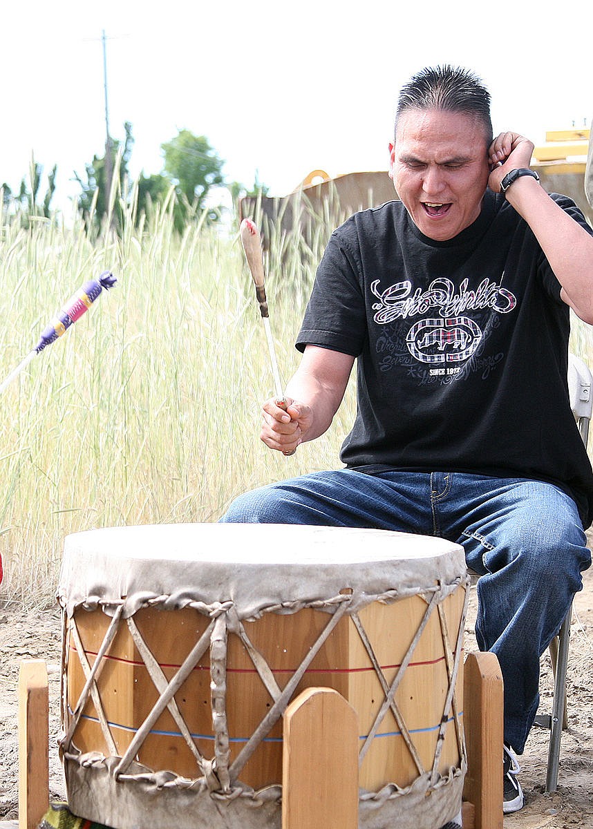 Drummer Keller Condor, Colville, plays the honor song during the groundbreaking ceremony for the Colville Fuel Half-Sun Travel Plaza.
