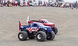 Monster trucks invade sand dunes Saturday