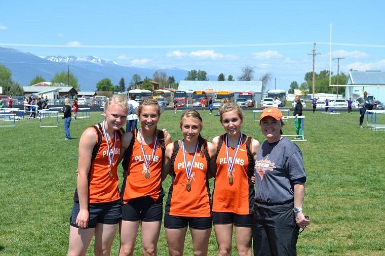 &lt;p&gt;Kayla Holmes, Hailey Phillips, Kelsey Beagley, Nicole Rehbein and coach Denise Montgomery posing with their metals following their record setting victory in the 4x100 relay.&lt;/p&gt;