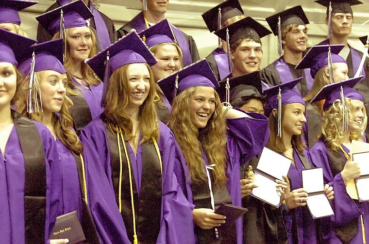 Jaris Kelley stands at the center of the 2010 graduating class from Charlo High School.