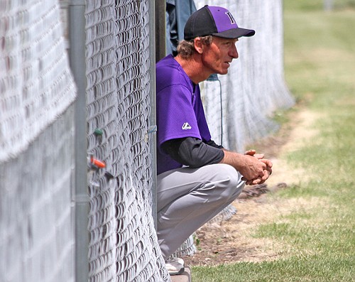 Rockies' manager Alan Anderson watches his team from the dugout last Sunday in St. Ignatius.