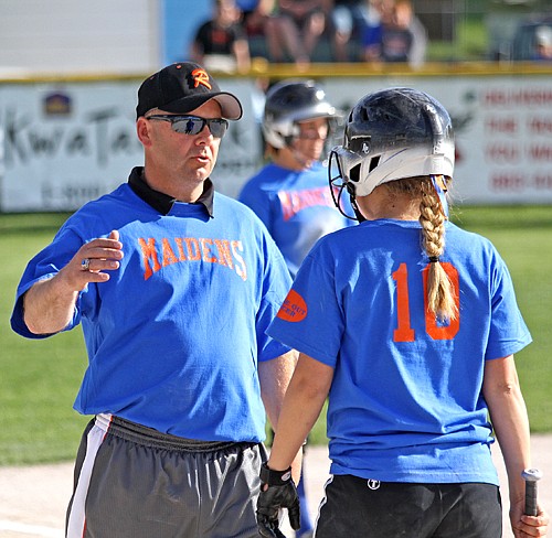 Coach Steve Woll and the Ronan Maidens donned royal blue uniforms to show support for their head coach, Tom Peterson.