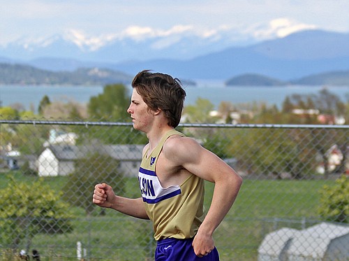 Polson Alex Nystrom runs the 1,500-meter run.