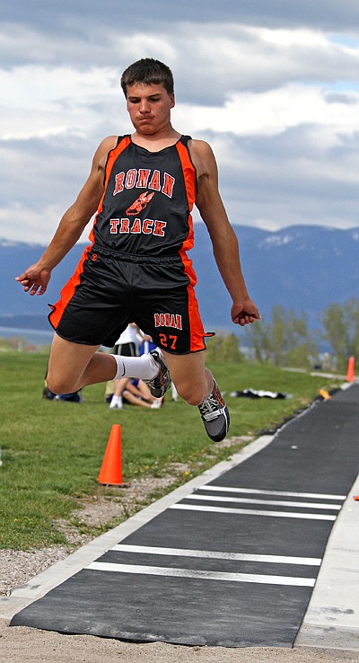 Jalen Bell takes a leap at the long jump for the Ronan-Mission Chiefs.