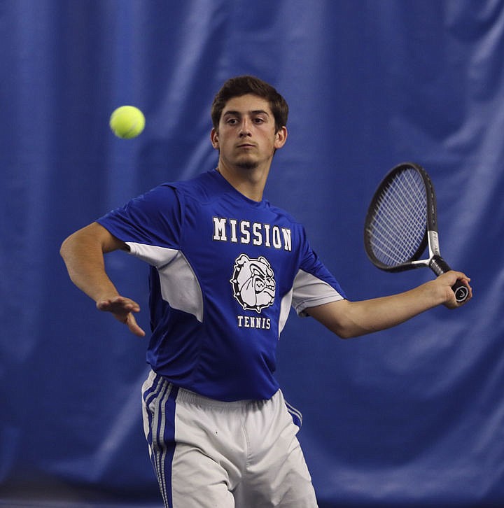 &lt;p&gt;Andrew Esslinger returns a ball during the semifinal match at the state tournament in Missoula on Friday.&lt;/p&gt;