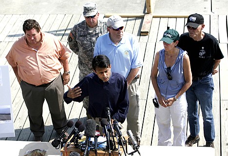 &lt;p&gt;From left, Plaquesmines Parish President Billy Nungesser, Louisiana National Guard J. Bennet Landreneau, the Louisiana Secretary of Wildlife and Fisheries, Mary Matlin, James Carville listen to Louisiana Governor Bobby Jindal speak to the media at Cypress Cover Marina in Venice, La.&lt;/p&gt;