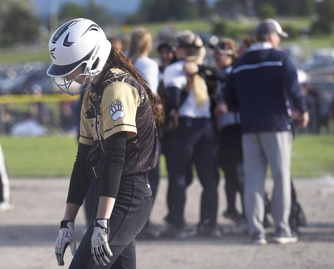 &lt;p&gt;Billings West junior Cody Rogers walks off the field as the Wolfpack celebrate their 4-3 win. (Aaric Bryan/Daily Inter Lake)&lt;/p&gt;