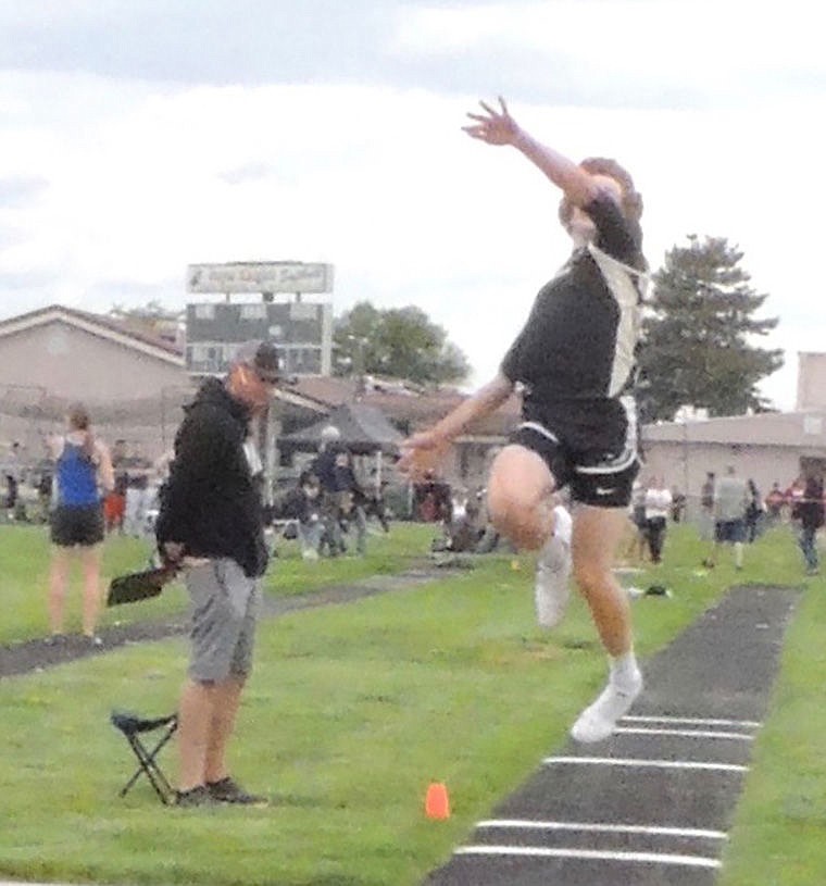 Royal&#146;s Joe Lang uncorks a leap of 22-3.75 in the long jump on his second attempt, coming within a quarter-inch of the school record, then goes about qualifying for state in two more events.