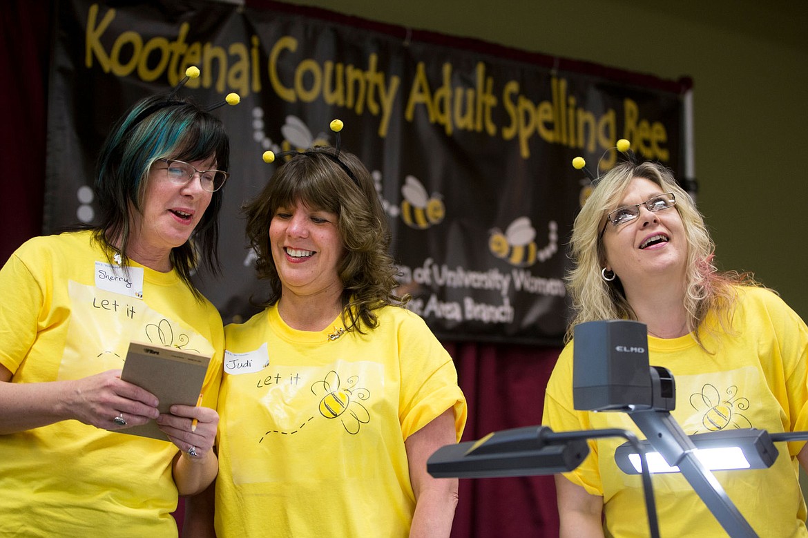 &lt;p&gt;From left to right, Sherry Jones, Judi Rabensteiner and Rachelle Chapman of the &quot;Let it Bee&quot; team react after misspelling a word at the Kootenai County Adult Spelling Bee on Thursday at North Idaho College.&lt;/p&gt;