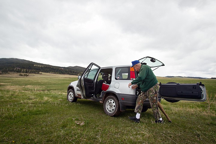 &lt;p&gt;Oakland unloads hunting gear from his sport utility vehicle after parking on a high ridge overlooking an expanse of prairie land inhabited by ground squirrels.&lt;/p&gt;