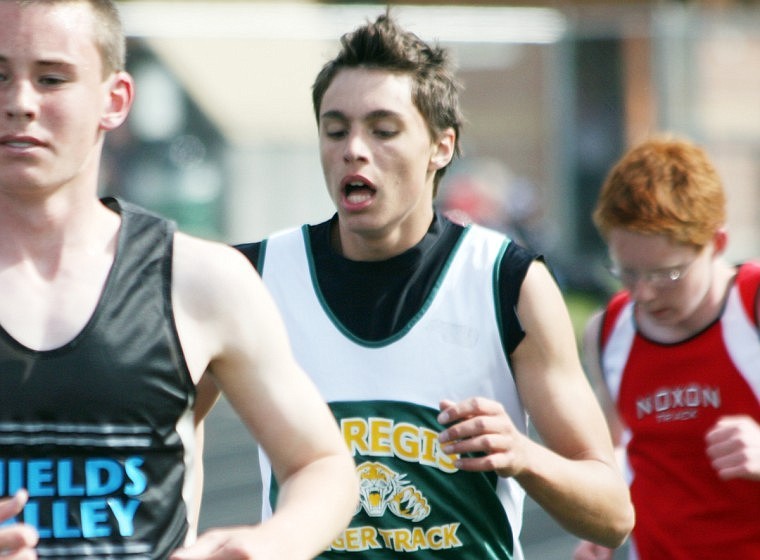 Thomas Spencer runs in the two mile race where he placed seventh. Spencer qualified for state in the high jump.