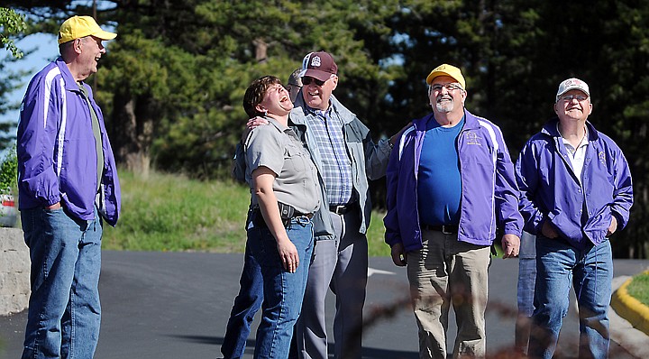 &lt;p&gt;Park Manager Amy Grout, center, shares a celebratory laugh with members of the Kalispell Sunriser Lions after the installation of the new flagpole and raising of the flag on Thursday, May 22, at Lone Pine State Park. (Brenda Ahearn/Daily Inter Lake)&lt;/p&gt;