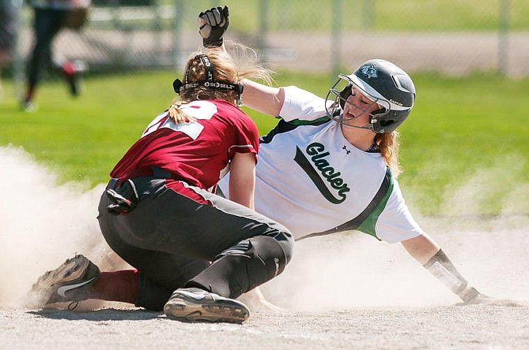 &lt;p&gt;Glacier senior Anna Jenks (right) slides safely into third base Thursday afternoon during Glacier&#146;s Western AA softball game with Helena High at Kidsports Complex.&#160;&lt;/p&gt;