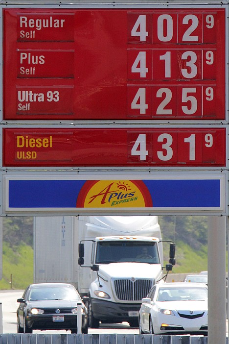 &lt;p&gt;Gasoline prices greet motorists at the Midway Plaza on the Pennsylvania Turnpike in Bedford, Pa., on April 15.&lt;/p&gt;