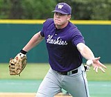 Huskies coach hopes young team can reach CWS