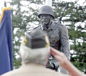 &lt;p&gt;Larry Pitcher saluting during dedication of Veterans Memorial at Riverfront Park Monday evening.&lt;/p&gt;