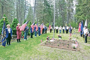 &lt;p&gt;Honoring veterans and the fallen this Memorial Day 2014. Members of John E. Freeman Post 5514 of VFW and the Ladies Auxiliary at Milnor Lake Cemetery Monday.&lt;/p&gt;