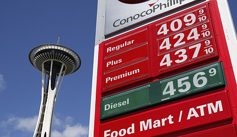 &lt;p&gt;Gas prices at well over $4 per gallon are posted at a station near downtown Seattle and in view of the Space Needle, Friday. With gas prices still topping the $4-a-gallon mark in much of the country and forcing holiday travelers to spend more on fill-ups than they will on hotel rooms, this could be shaping up as the Memorial Day weekend where half the fun is not in getting there.&lt;/p&gt;