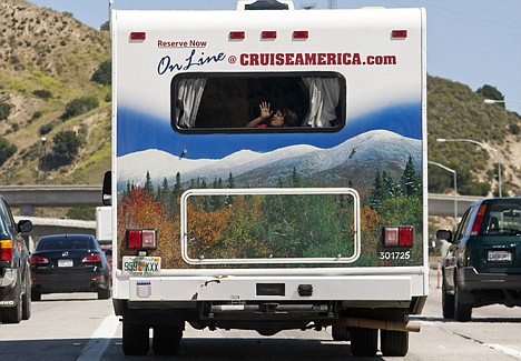 &lt;p&gt;Travelers in a motor home drive north along the Interstate 5 Highway for an early start on the Memorial Day weekend traffic in Los Angeles Friday.&lt;/p&gt;