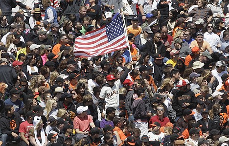 &lt;p&gt;A San Francisco Giants fan waves an American flag during Memorial Day at a baseball game between the San Francisco Giants and the Arizona Diamondbacks in San Francisco, Monday, May 28, 2012. (AP Photo/Jeff Chiu)&lt;/p&gt;