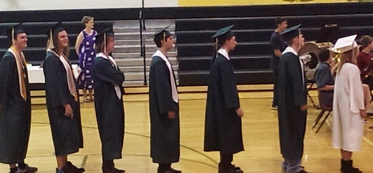 &lt;p&gt;Dallas Lewis, Keenan Clute, Blaze White and Damen Lucier enter the gym and make their way to the stage.&#160;&lt;/p&gt;