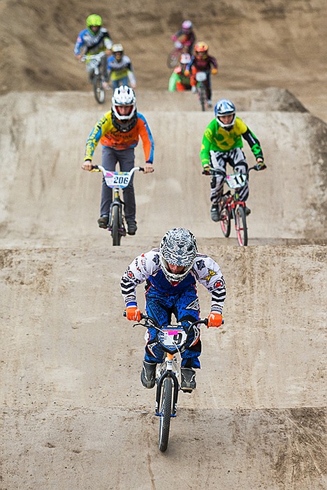 &lt;p&gt;Soldiers of Dirt racing team rider Vitalli Saccone, 20, maneuvers his bike over a rhythm section of the Cherry Hill track.&lt;/p&gt;