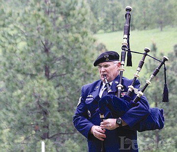 &lt;p&gt;James Pettit plays &quot;Amazing Grace&quot; at the graveside of Medal of Honor recipient Laverne Parrish in Ronan on Monday.&lt;/p&gt;