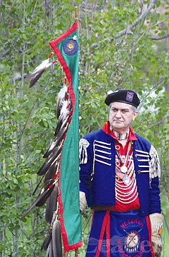 &lt;p&gt;Veteran Warrior Society Commander Dan Jackson listens to speakers during Memorial Day observances in Ronan City Park on Monday.&lt;/p&gt;