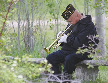 &lt;p&gt;Jerry Akers prepares for Memorial Day observances in Ronan City Park on Monday.&lt;/p&gt;